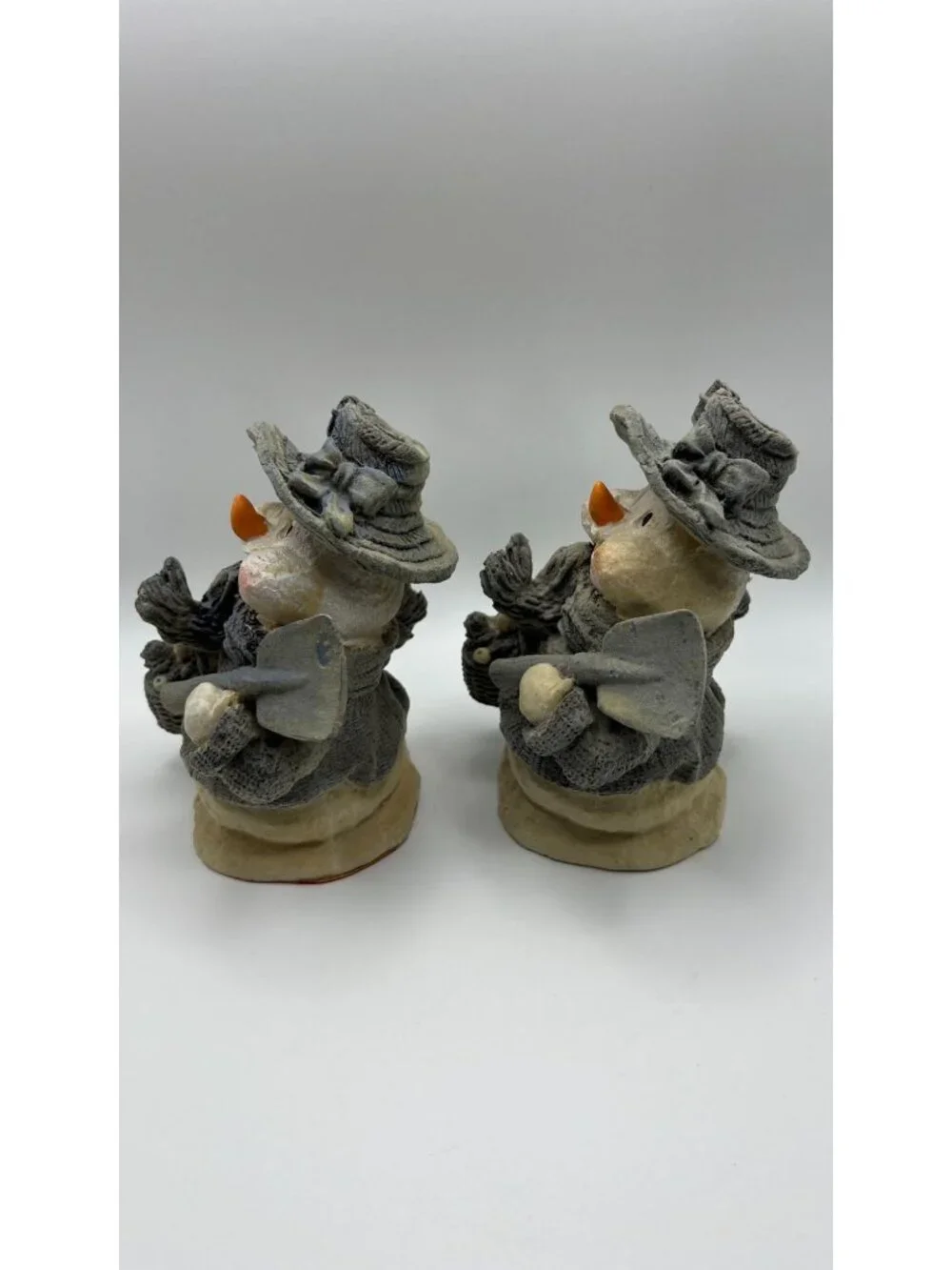 Pair Of Snowman Figurines With Hats & Scarves Holding Shovels Winter Decor